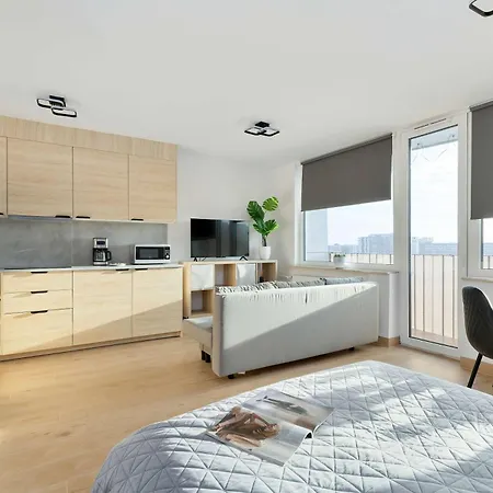 Beige And Grey In With Balcony Close To The By Renters Apartman Gdańsk